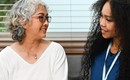 Bigstock Carrying Female Doctor Talking 464299629 (1)